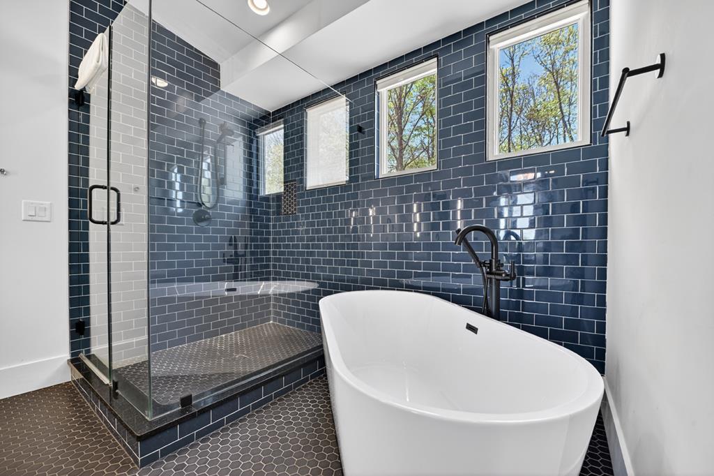 315 Blue Berry Ridge Morganton, GA 30560 - Photo 28 of 61 a bathroom with a bathtub and shower