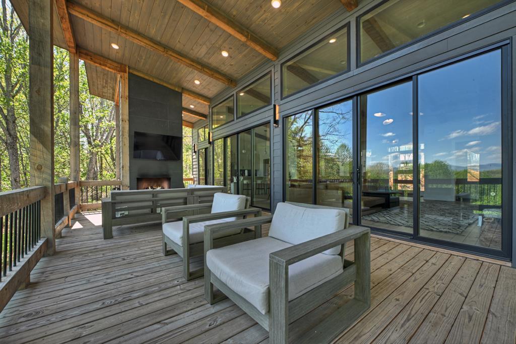 315 Blue Berry Ridge Morganton, GA 30560 - Photo 35 of 61 a building outdoor space with patio furniture and wooden floor