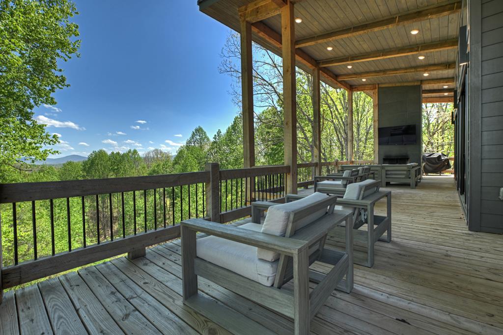 315 Blue Berry Ridge Morganton, GA 30560 - Photo 36 of 61 a view of balcony with wooden floor and outdoor seating