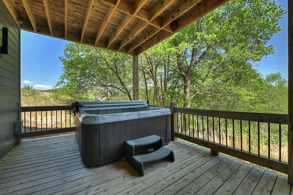 315 Blue Berry Ridge Morganton, GA 30560 - Photo 48 of 61 a view of balcony with wooden floor and outdoor seating