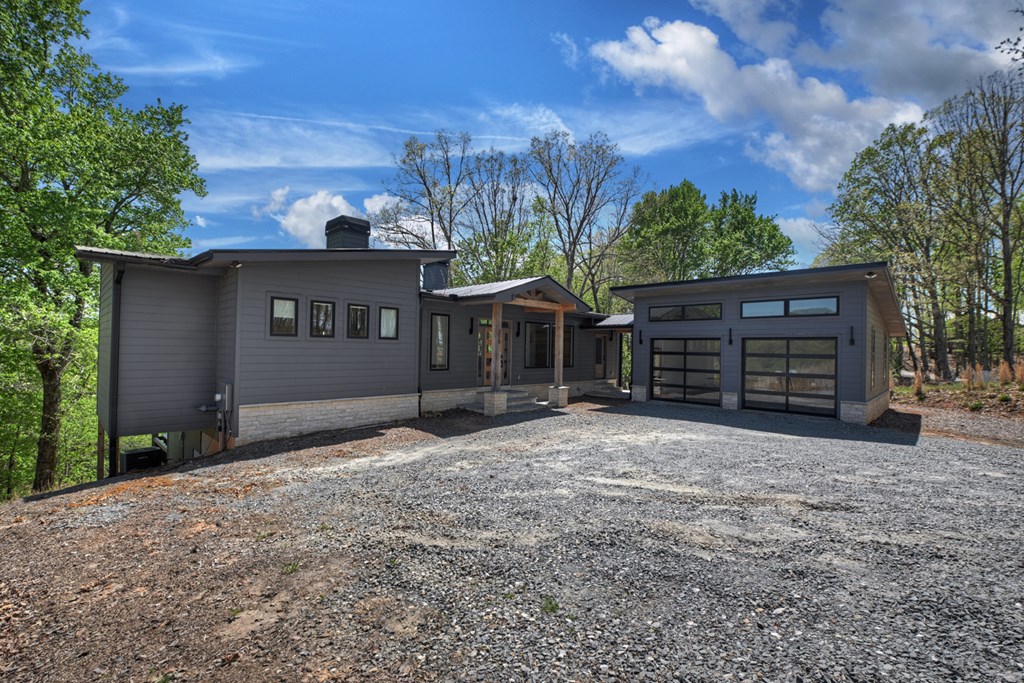 315 Blue Berry Ridge Morganton, GA 30560 - Photo 54 of 61 a front view of a house with a yard and garage