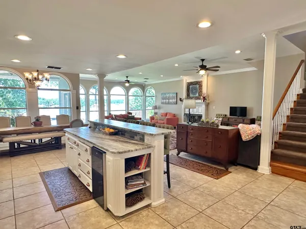 a kitchen with stainless steel appliances granite countertop a stove and a sink