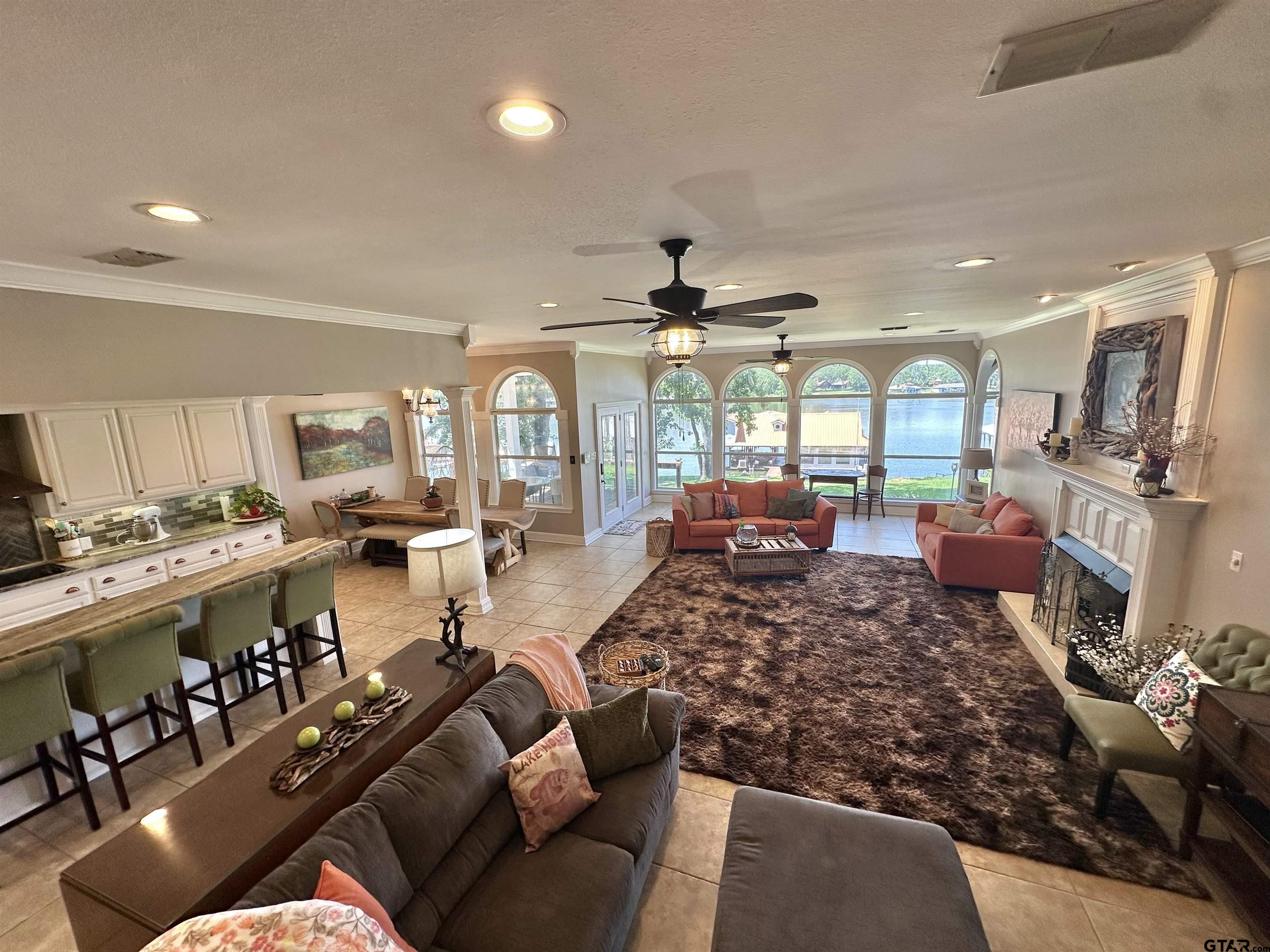 13449 South Hillcreek Road Whitehouse, TX 75791 - Photo 13 of 41 a living room with lots of furniture and a large window