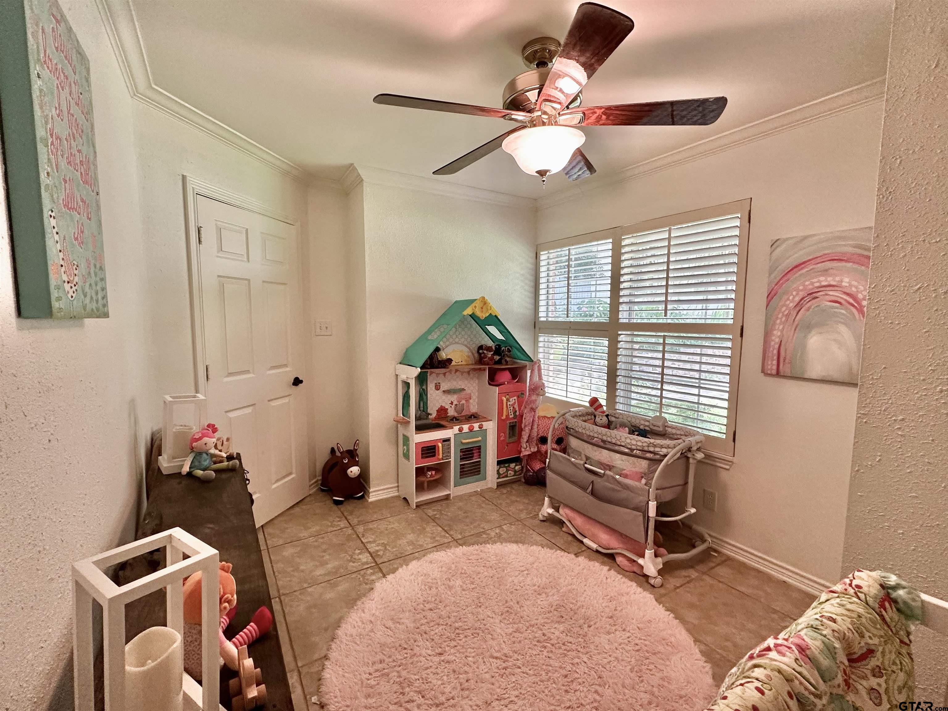 13449 South Hillcreek Road Whitehouse, TX 75791 - Photo 22 of 41 a bedroom with furniture and a window