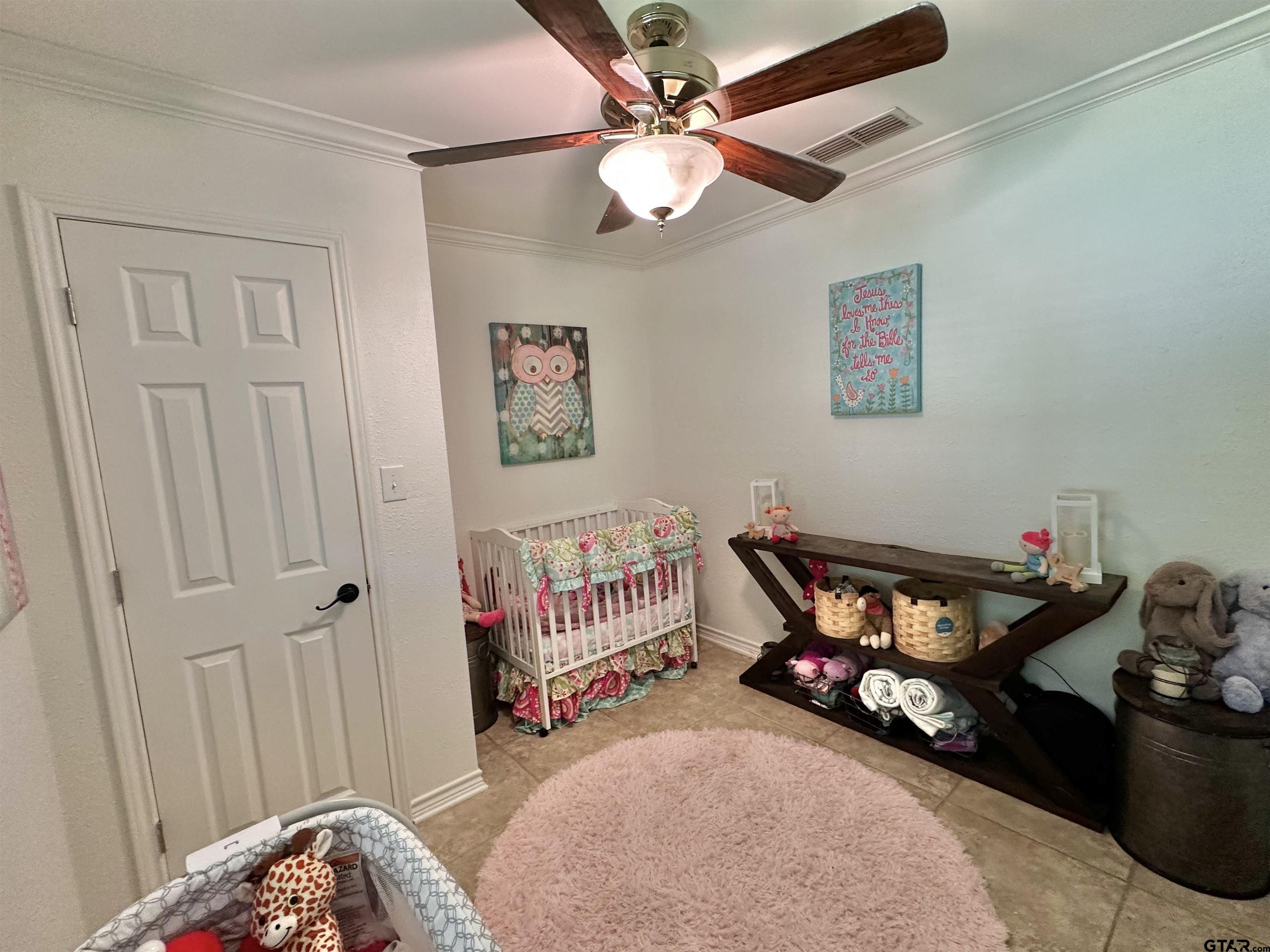 13449 South Hillcreek Road Whitehouse, TX 75791 - Photo 23 of 41 a bedroom with furniture and a window