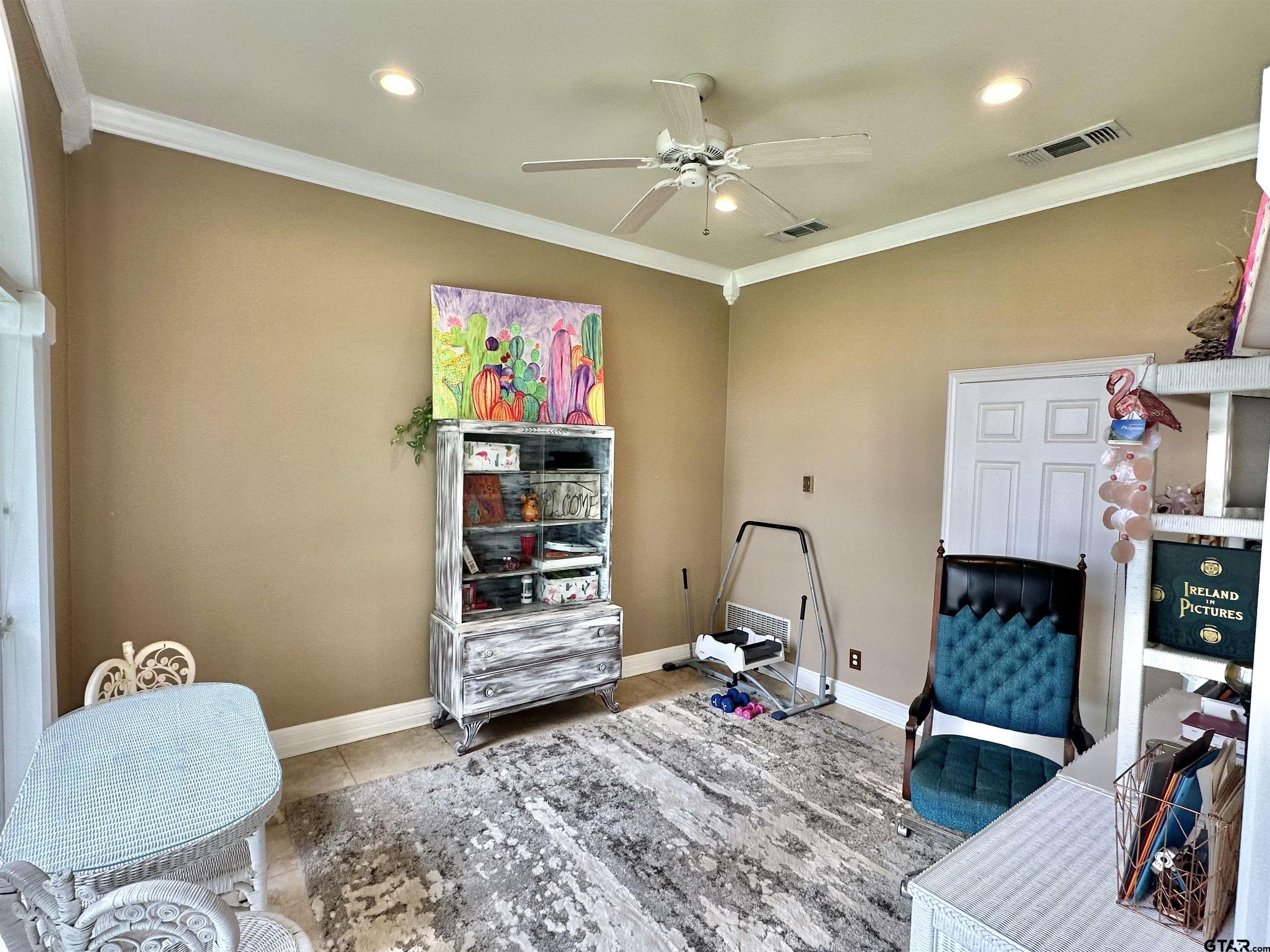 13449 South Hillcreek Road Whitehouse, TX 75791 - Photo 27 of 41 a living room with furniture and a flat screen tv