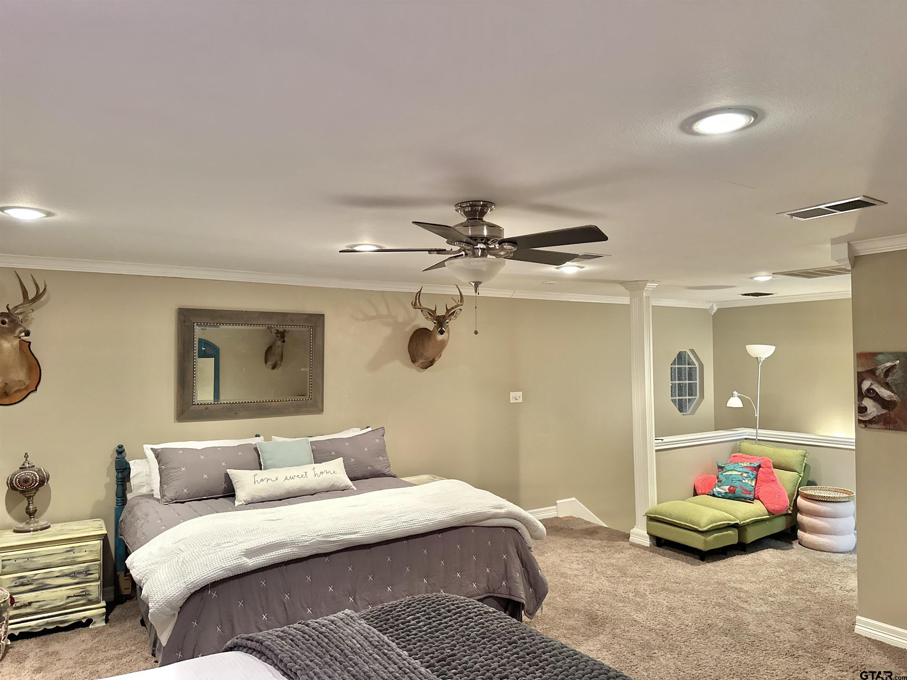 13449 South Hillcreek Road Whitehouse, TX 75791 - Photo 29 of 41 a bedroom with a bed and a mirror