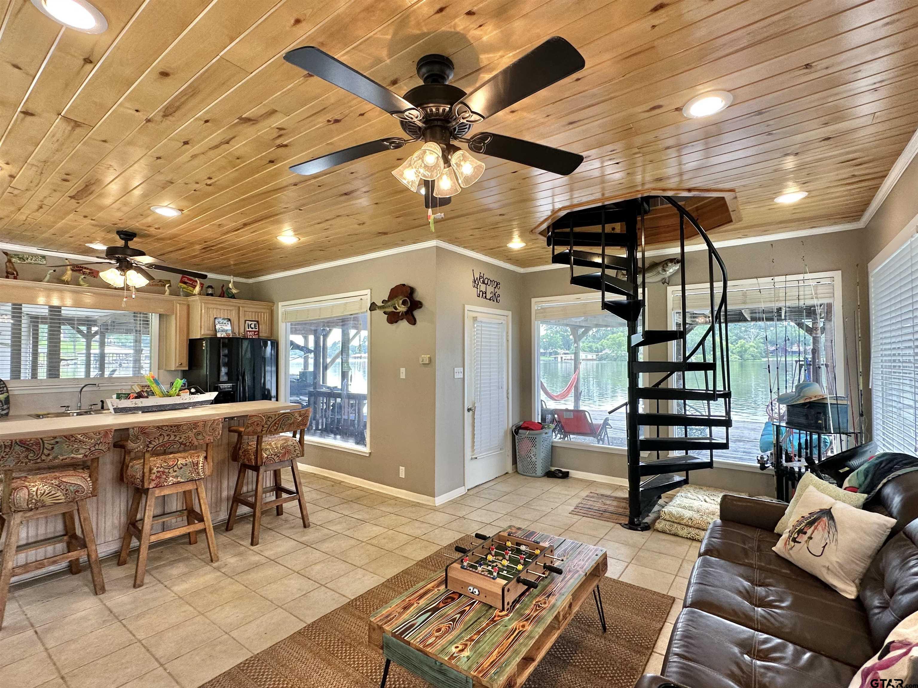 13449 South Hillcreek Road Whitehouse, TX 75791 - Photo 39 of 41 a living room with furniture a rug and white walls