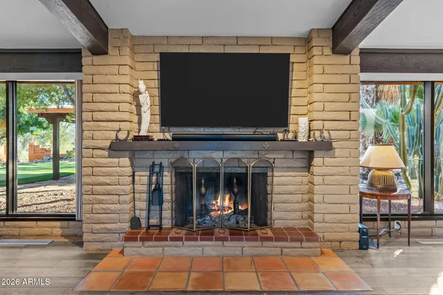 a kitchen with stainless steel appliances granite countertop a stove oven and a refrigerator with cabinets
