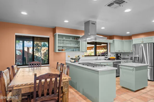 a living room with furniture window and a flat screen tv