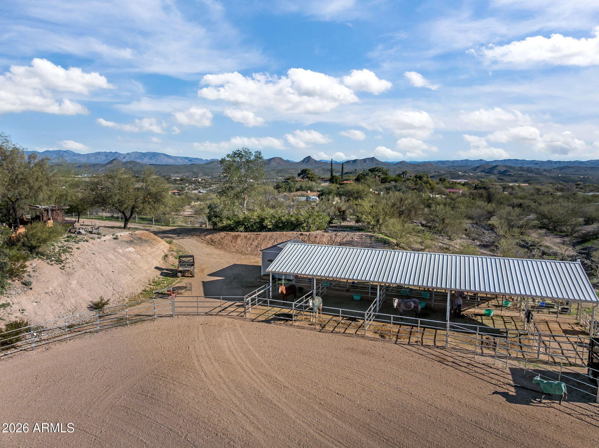 1349 North Forty Road Wickenburg, AZ 85390 - Photo 5 of 49 a view of a terrace with a bench