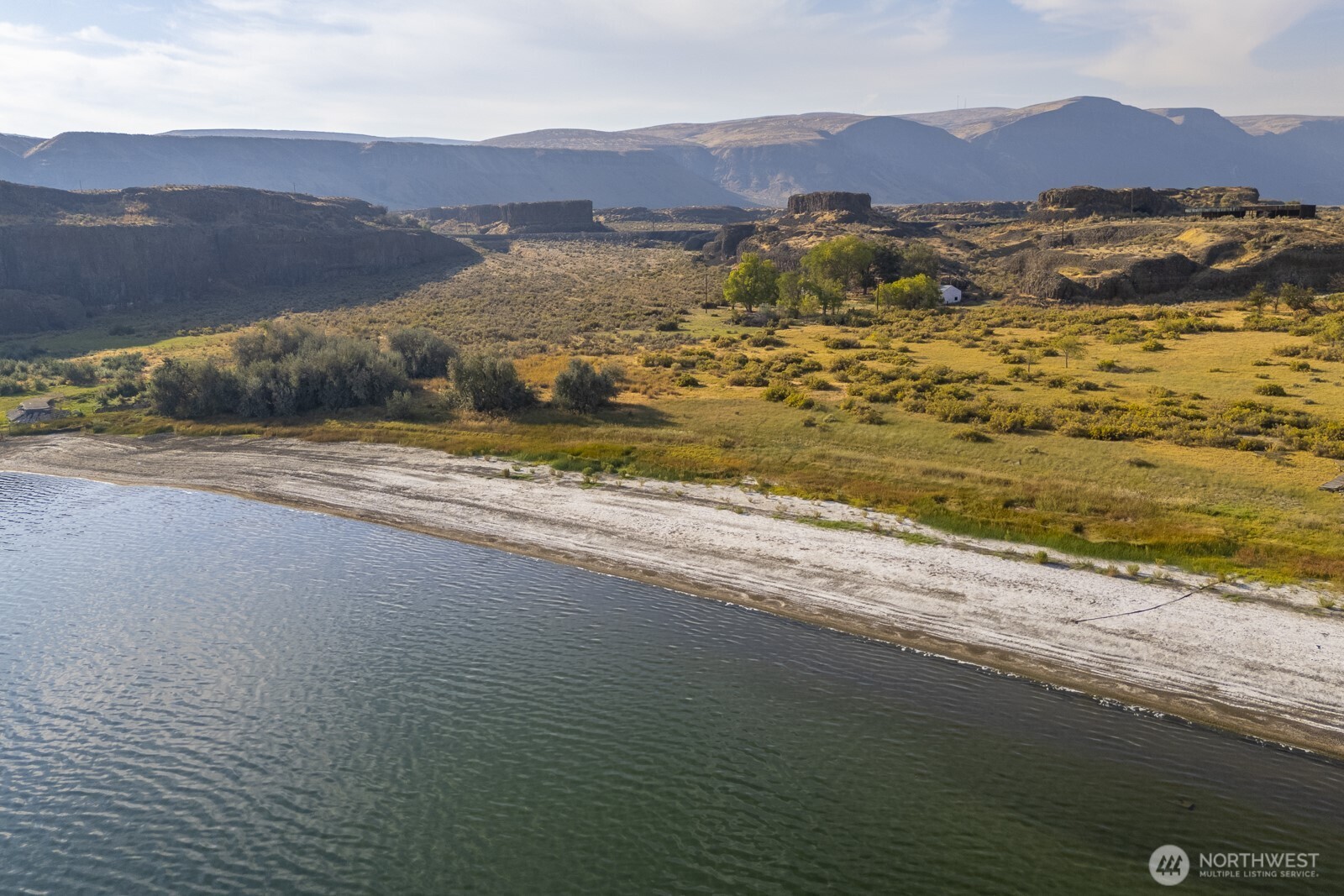605 Northwest 23rd Road Soap Lake, WA 98851 - Photo 12 of 28 a view of an ocean and a mountain