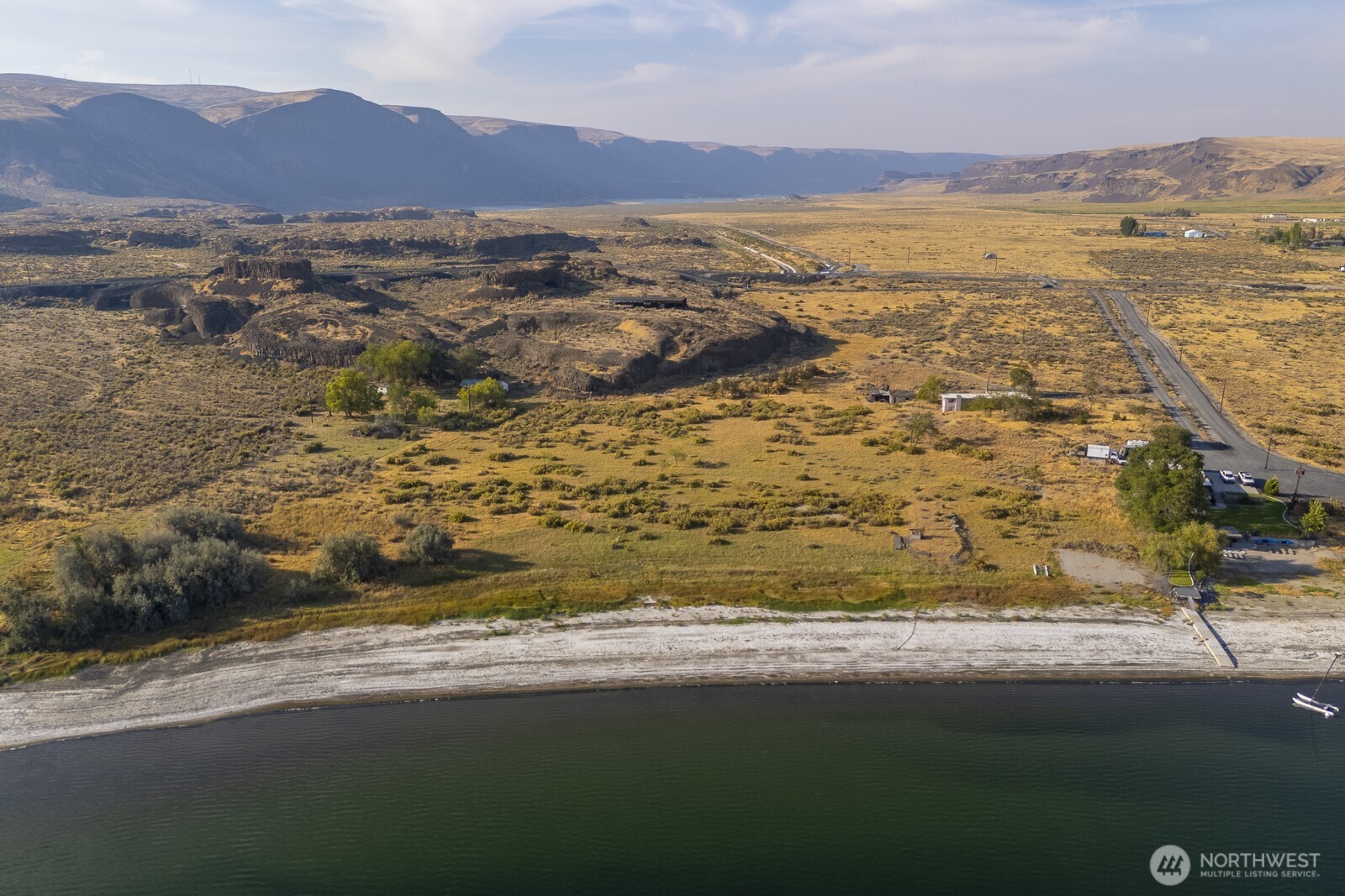 605 Northwest 23rd Road Soap Lake, WA 98851 - Photo 25 of 28 a view of an ocean and a mountain