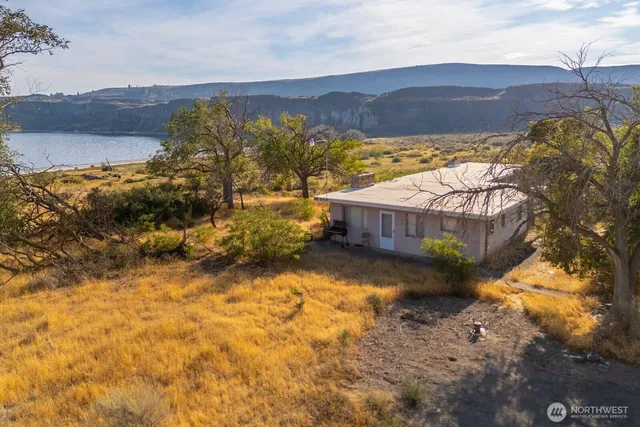 a view of a terrace with a lake view
