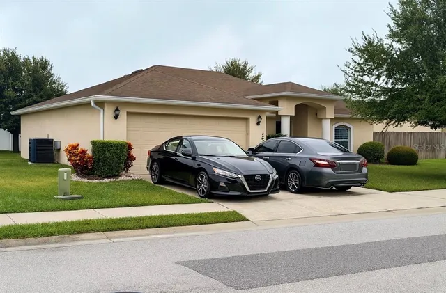 a car parked in front of a house