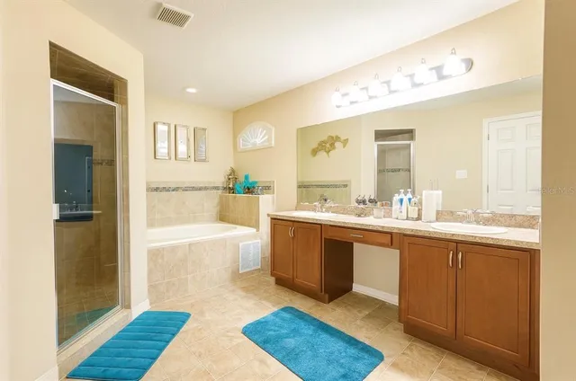 a view of a house with a garden and porch