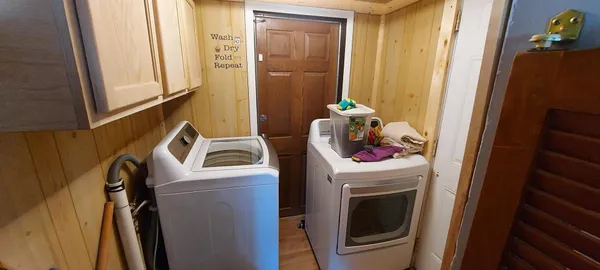 a utility room with dryer and washer