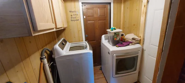 a view of an entryway with hardwood