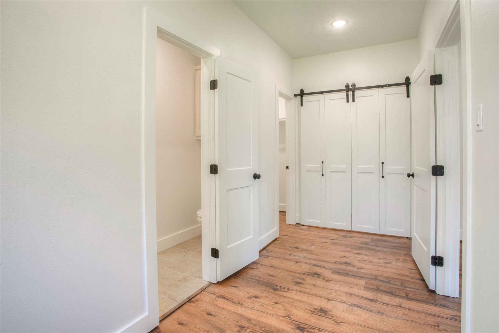 83 Dahlia Road Huntsville, TX 77320 - Photo 24 of 49 a view of a bathroom with a shower and a tub