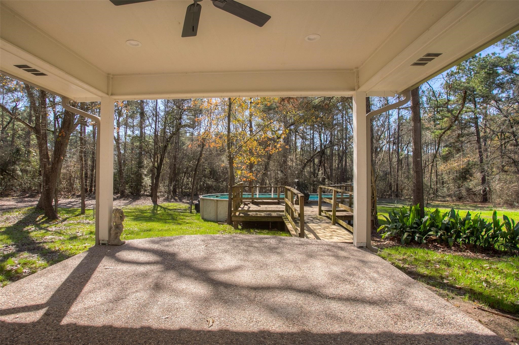 83 Dahlia Road Huntsville, TX 77320 - Photo 40 of 49 a view of swimming pool with a patio