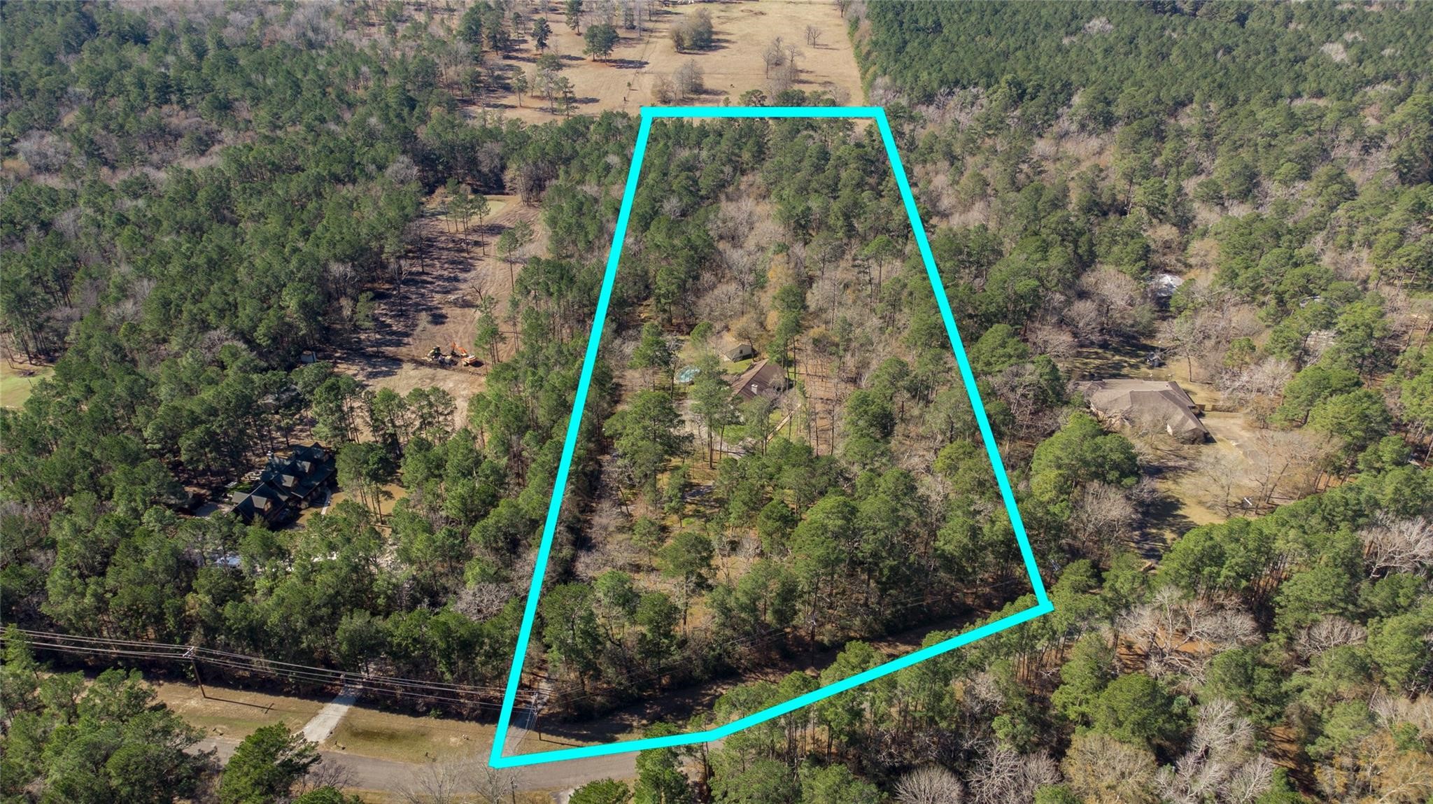 83 Dahlia Road Huntsville, TX 77320 - Photo 46 of 49 a view of a backyard