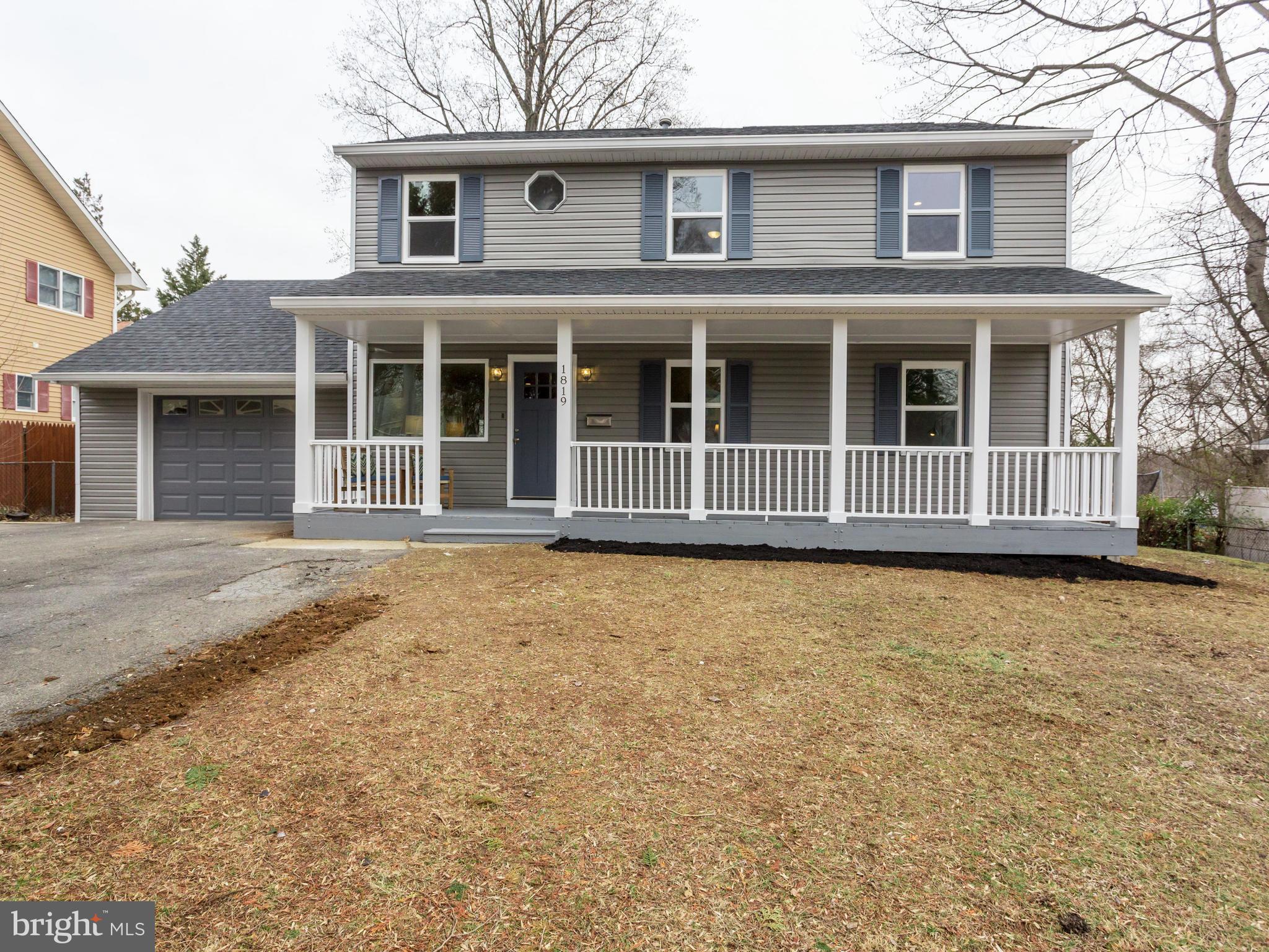 1819 Anderson Road Falls Church, VA 22043 - Photo 1 of 21 a front view of a house with a garden