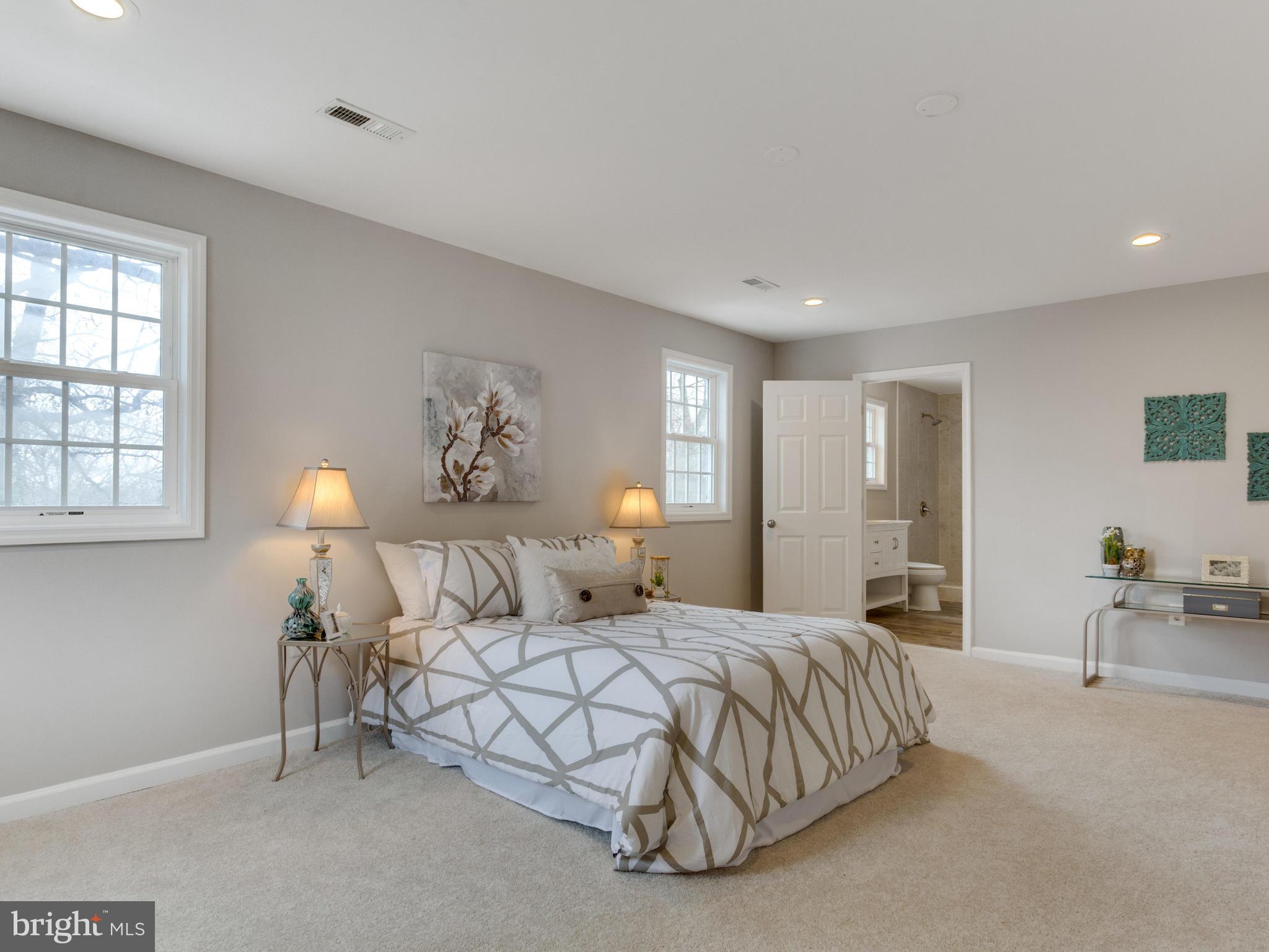 1819 Anderson Road Falls Church, VA 22043 - Photo 14 of 21 a bedroom with a bed and lamp with window