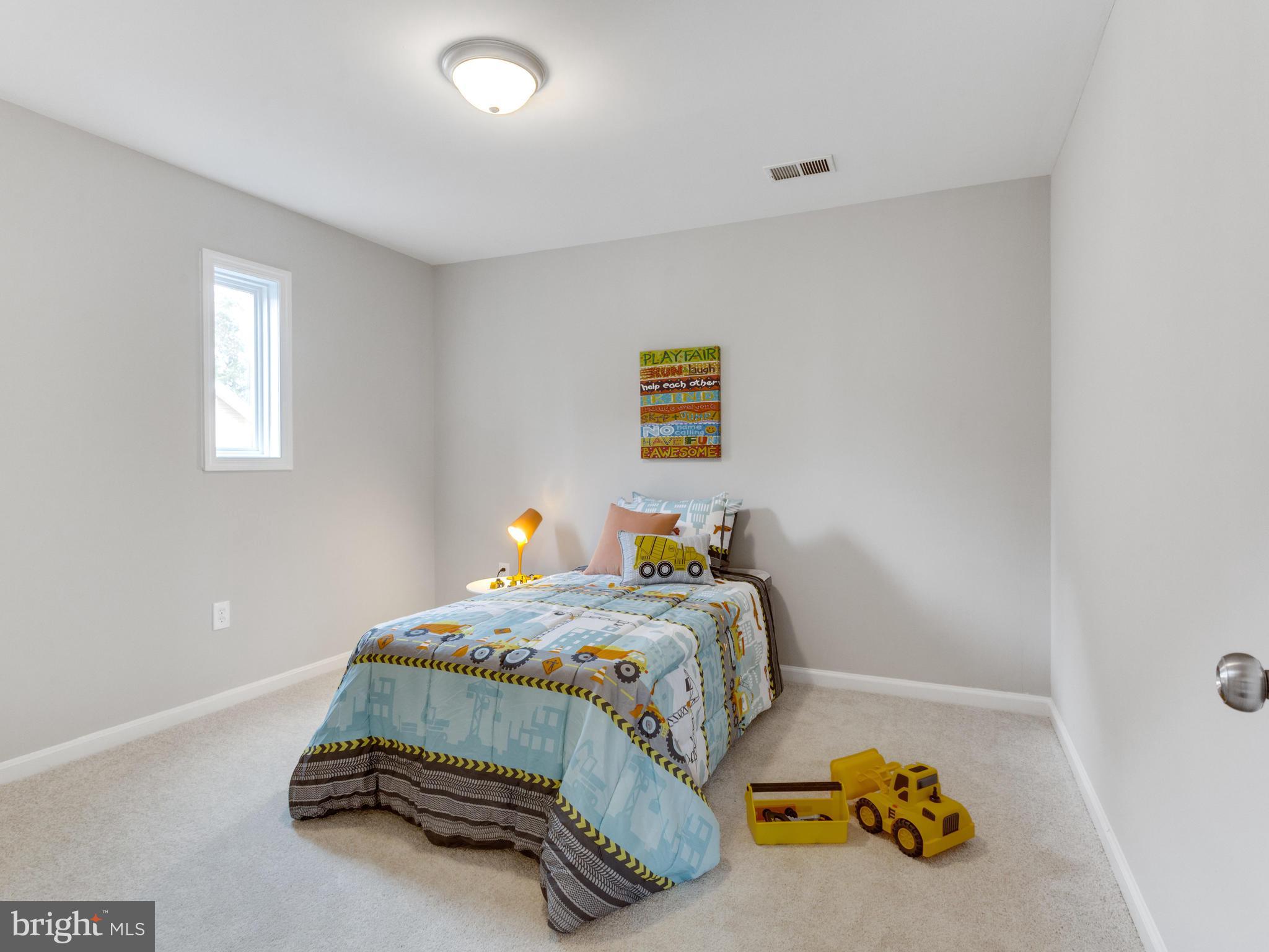 1819 Anderson Road Falls Church, VA 22043 - Photo 16 of 21 a bedroom with a bed and a window