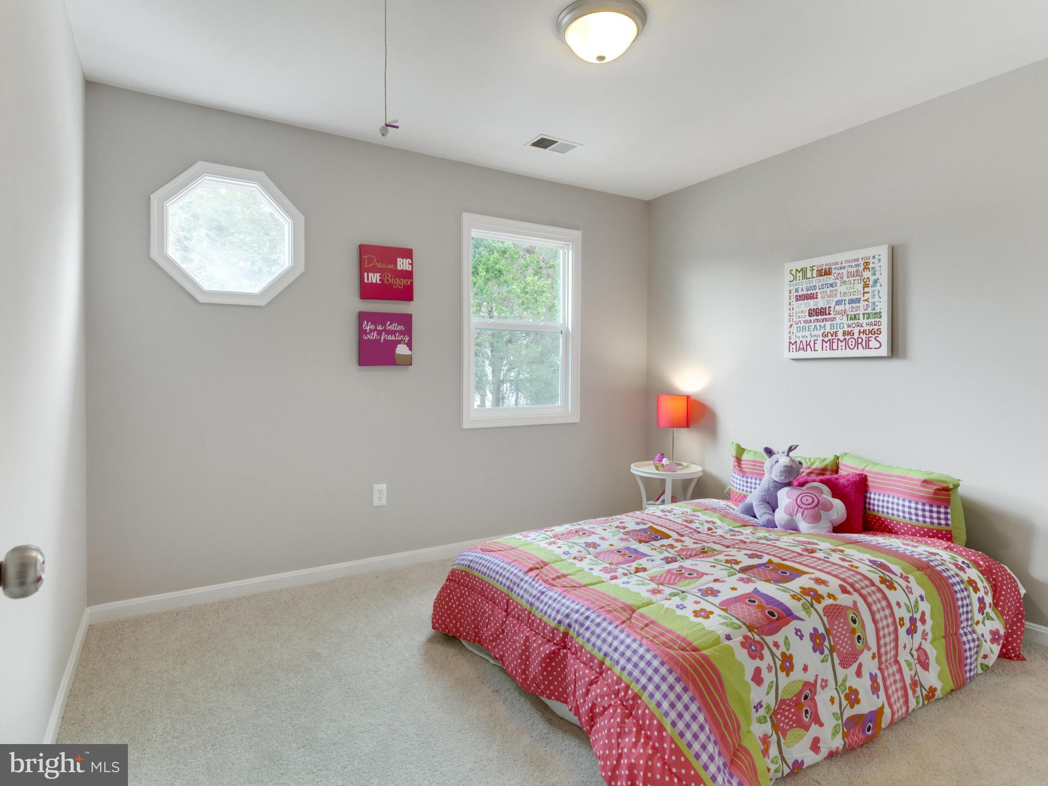 1819 Anderson Road Falls Church, VA 22043 - Photo 17 of 21 a bedroom with a bed and a painting on the wall
