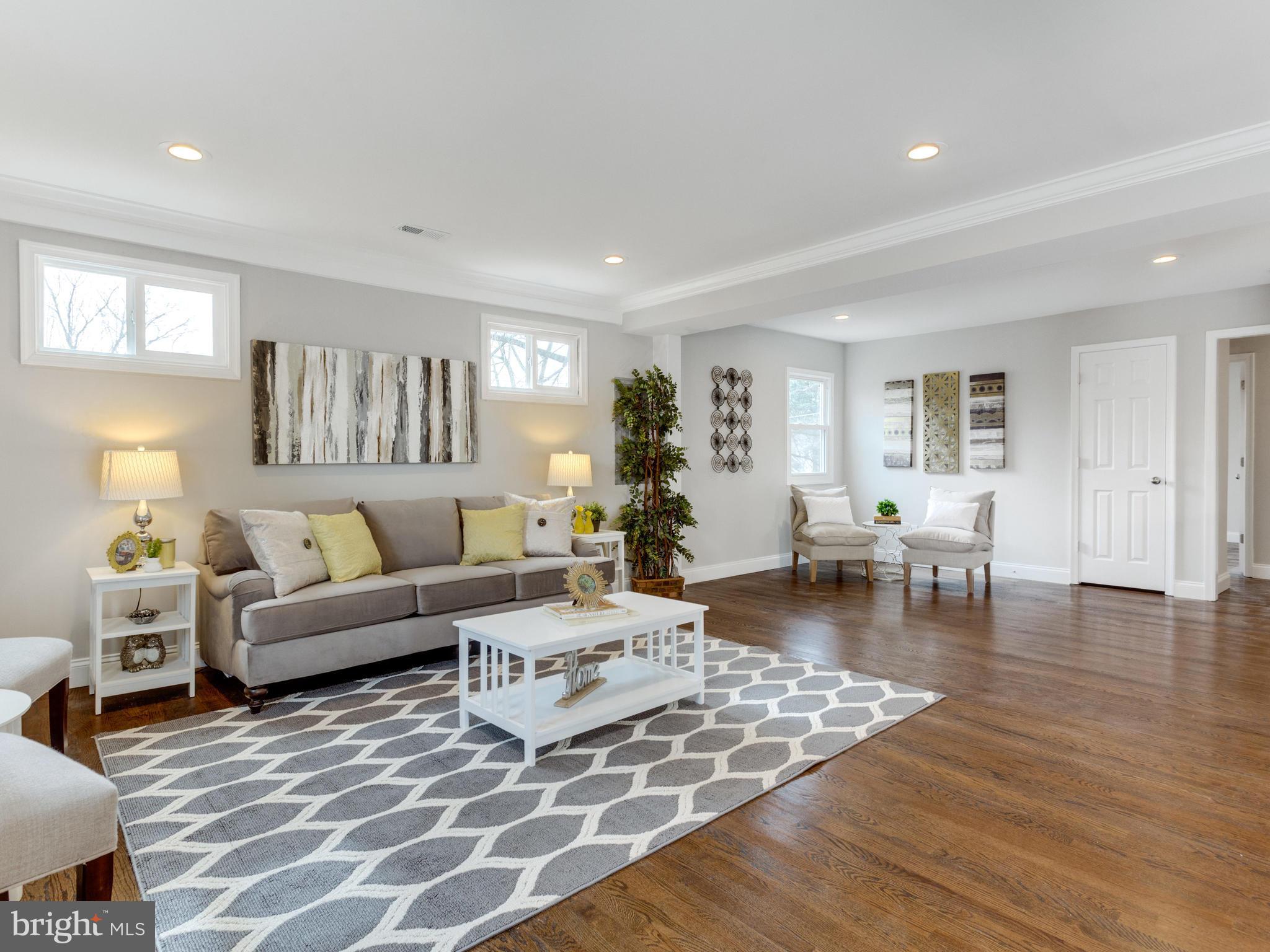 1819 Anderson Road Falls Church, VA 22043 - Photo 8 of 21 a living room with furniture and a wooden floor