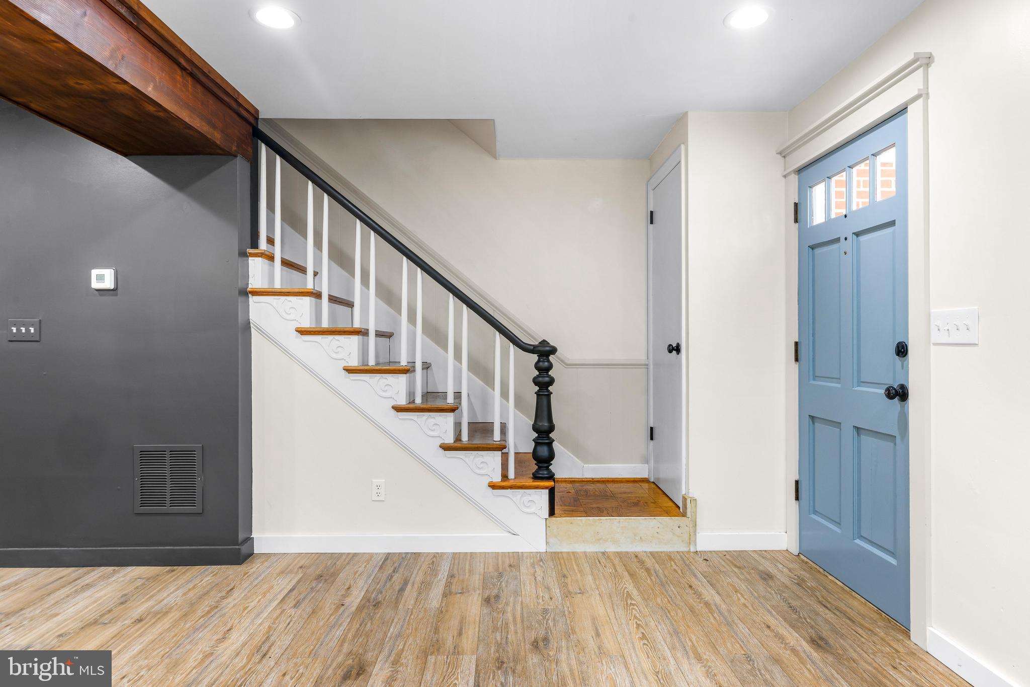 6204 Ebenezer Road Middle River, MD 21220 - Photo 12 of 70 a view of entryway and hall with wooden floor