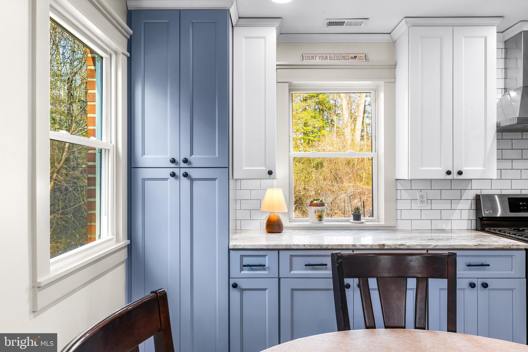 6204 Ebenezer Road Middle River, MD 21220 - Photo 20 of 70 a kitchen with a window a sink and a window