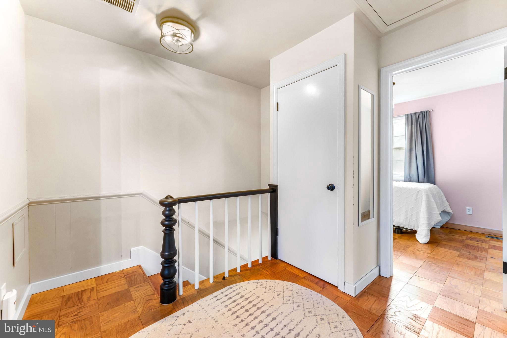 6204 Ebenezer Road Middle River, MD 21220 - Photo 34 of 70 a bedroom with a bed and a walk in closet