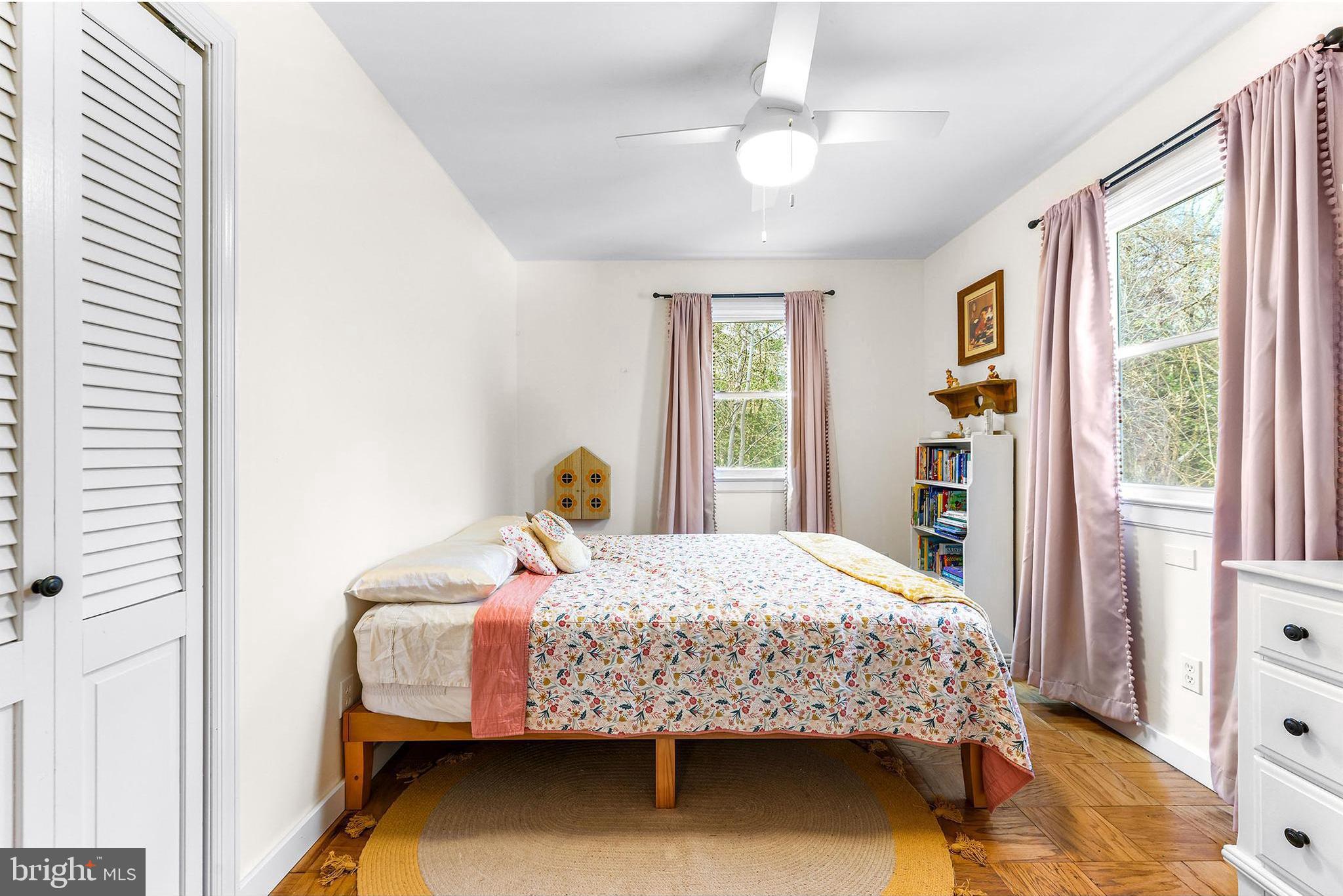 6204 Ebenezer Road Middle River, MD 21220 - Photo 37 of 70 a bedroom with a bed and a dresser