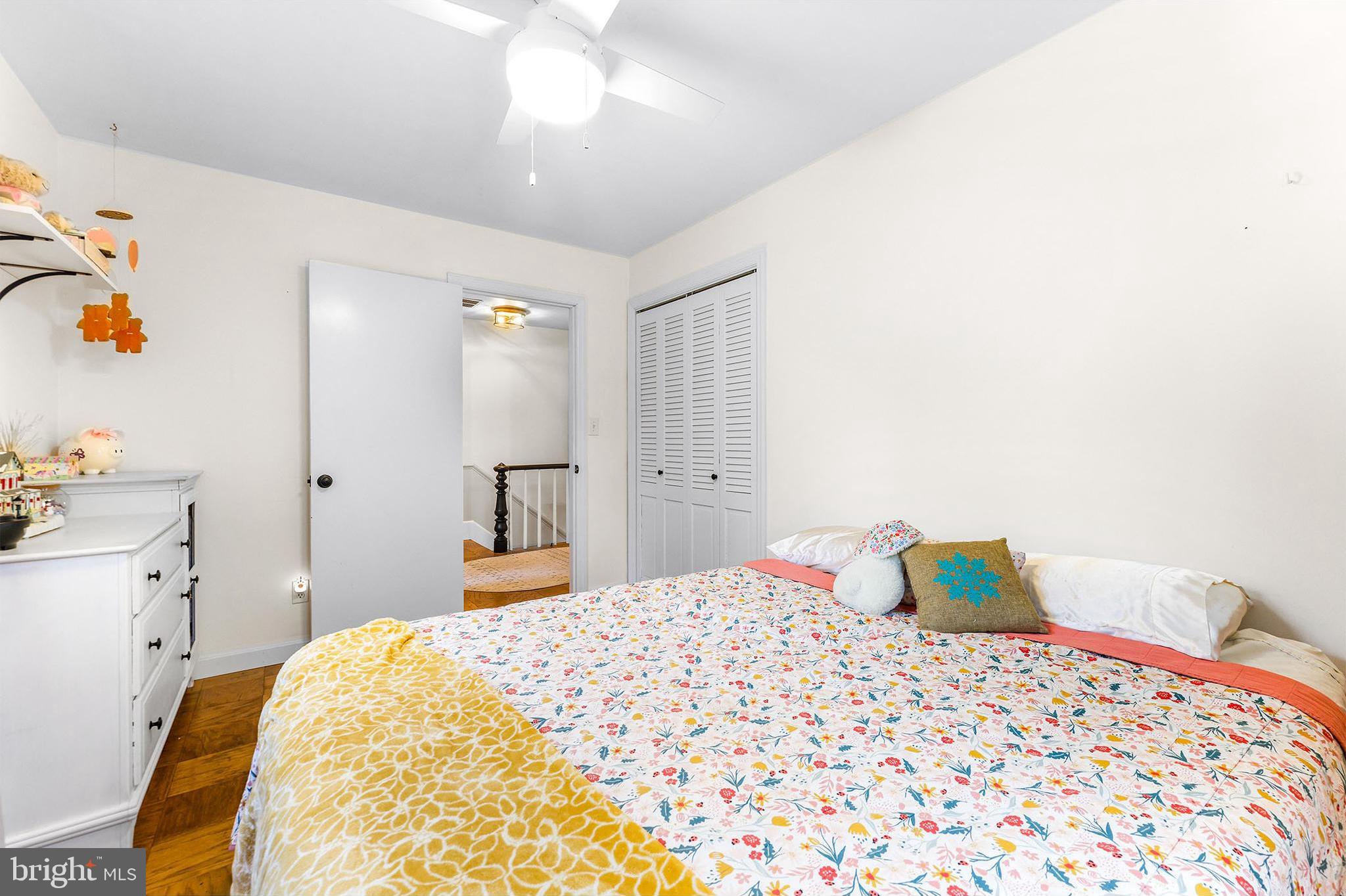 6204 Ebenezer Road Middle River, MD 21220 - Photo 38 of 70 a bedroom with a bed and cabinets