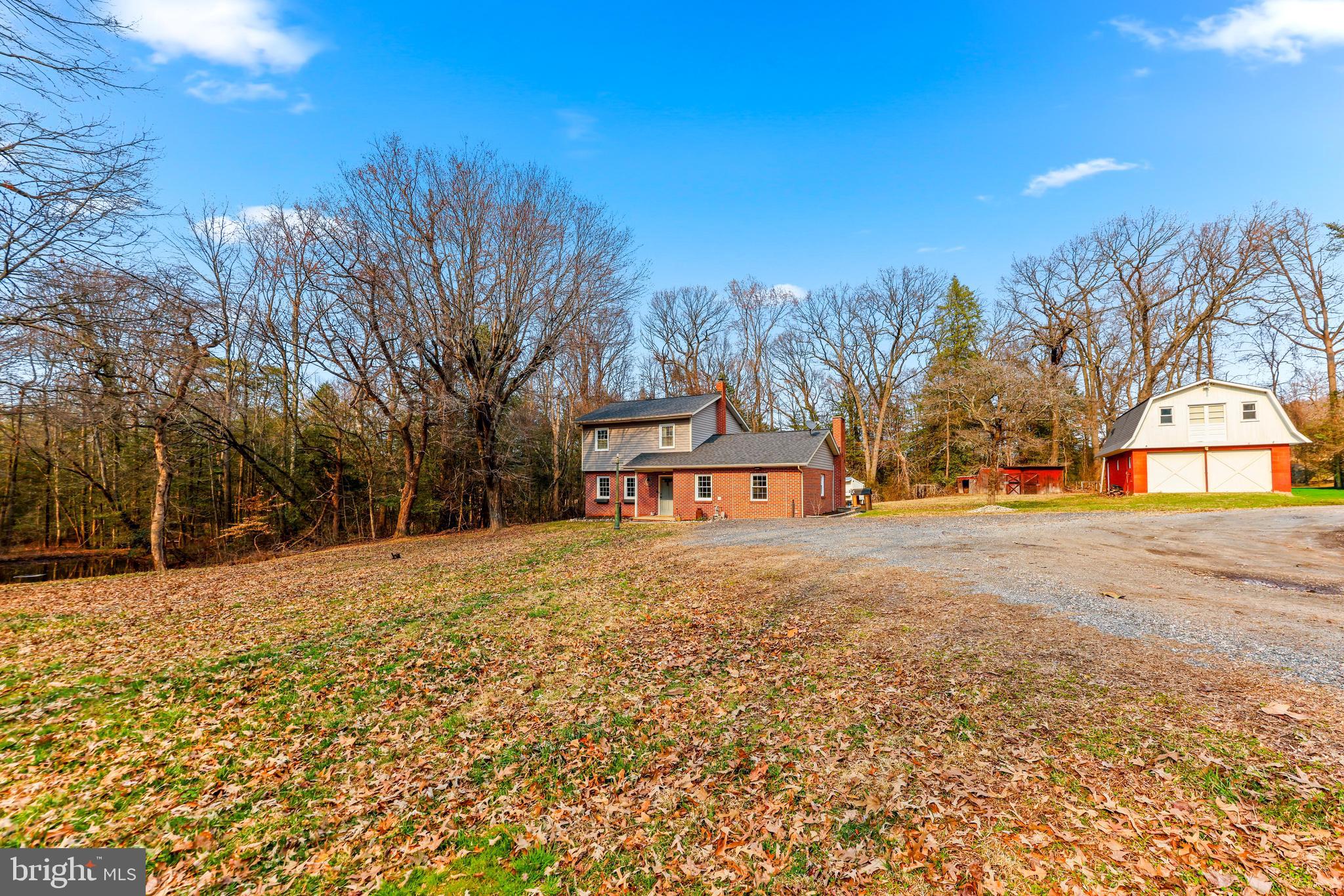 6204 Ebenezer Road Middle River, MD 21220 - Photo 4 of 70 a front view of a house with a yard and covered with snow