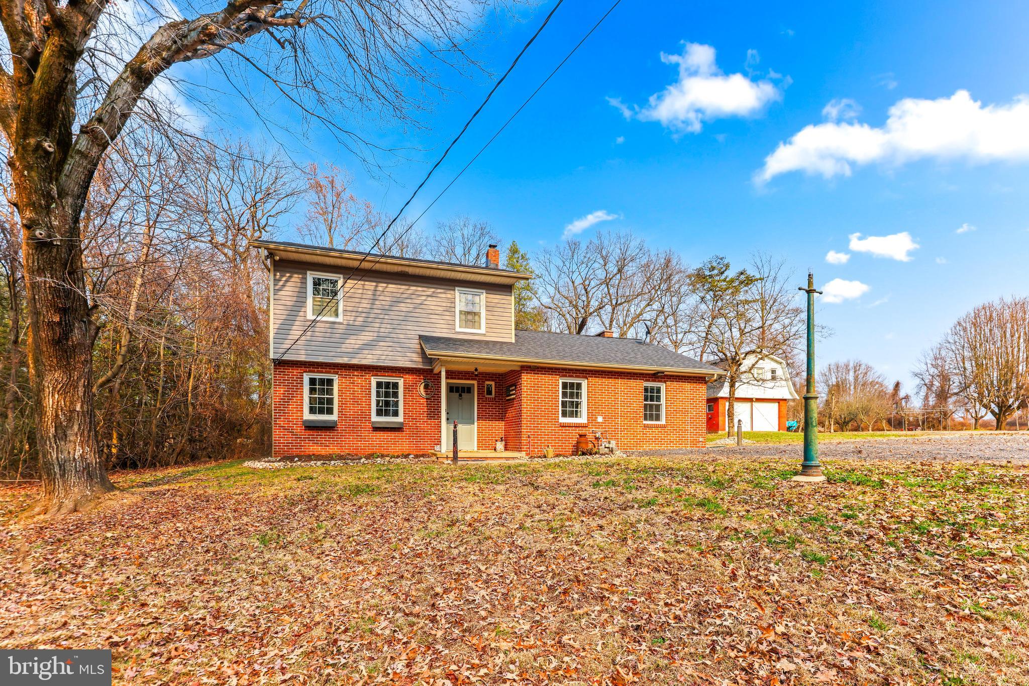 6204 Ebenezer Road Middle River, MD 21220 - Photo 5 of 70 a front view of a house with a yard