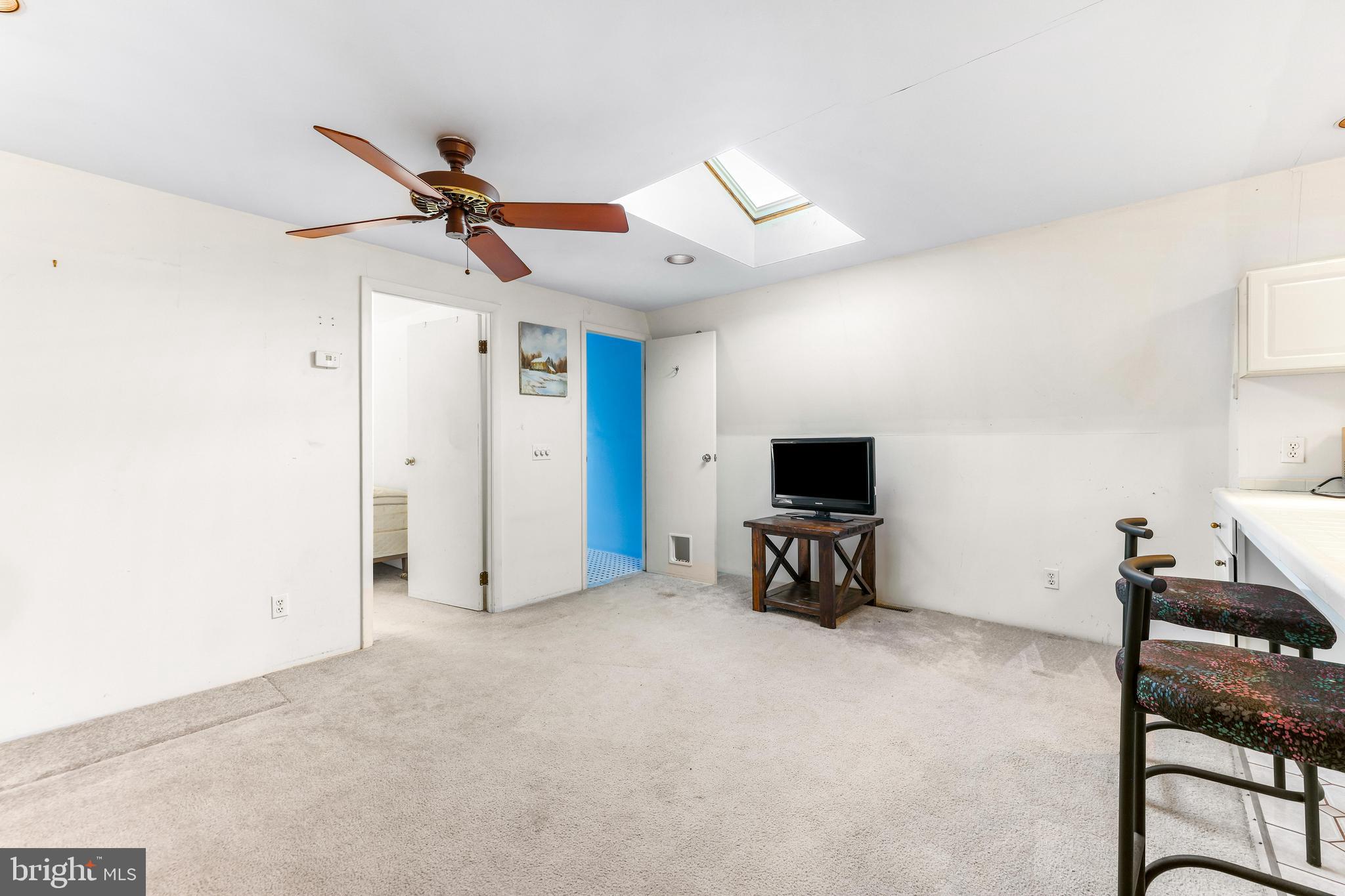 6204 Ebenezer Road Middle River, MD 21220 - Photo 51 of 70 a view of livingroom with furniture and a ceiling fan