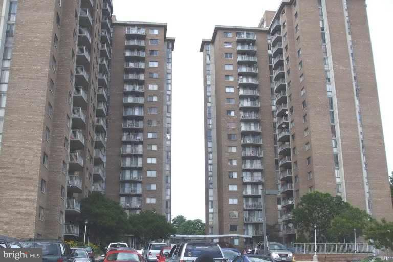 1836 Metzerott Road, Unit 1124 Hyattsville, MD 20783 - Photo 1 of 1 a view of a city with tall buildings