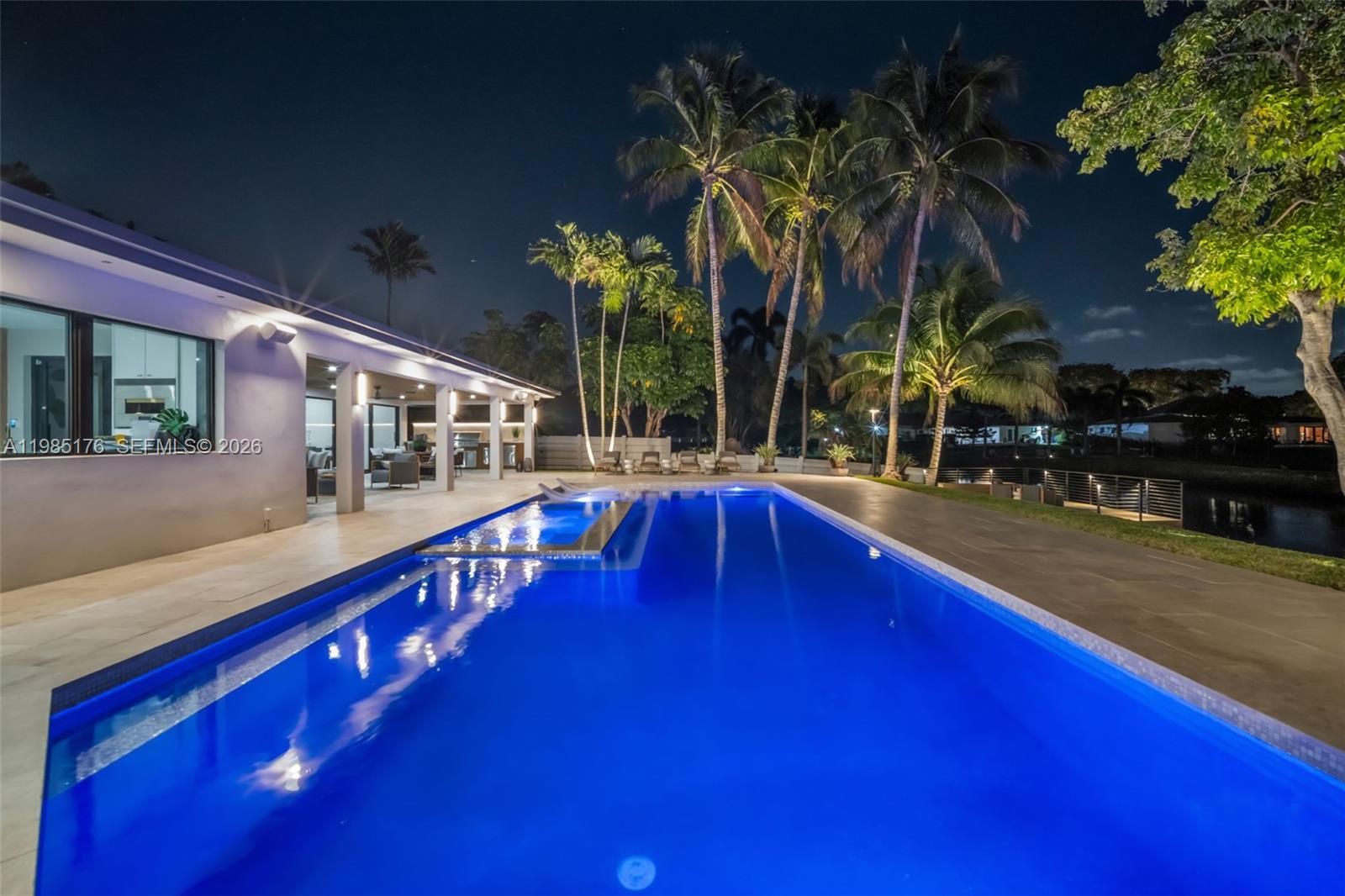 4430 Casper Court Hollywood, FL 33021 - Photo 62 of 64 a swimming pool with outdoor seating and yard