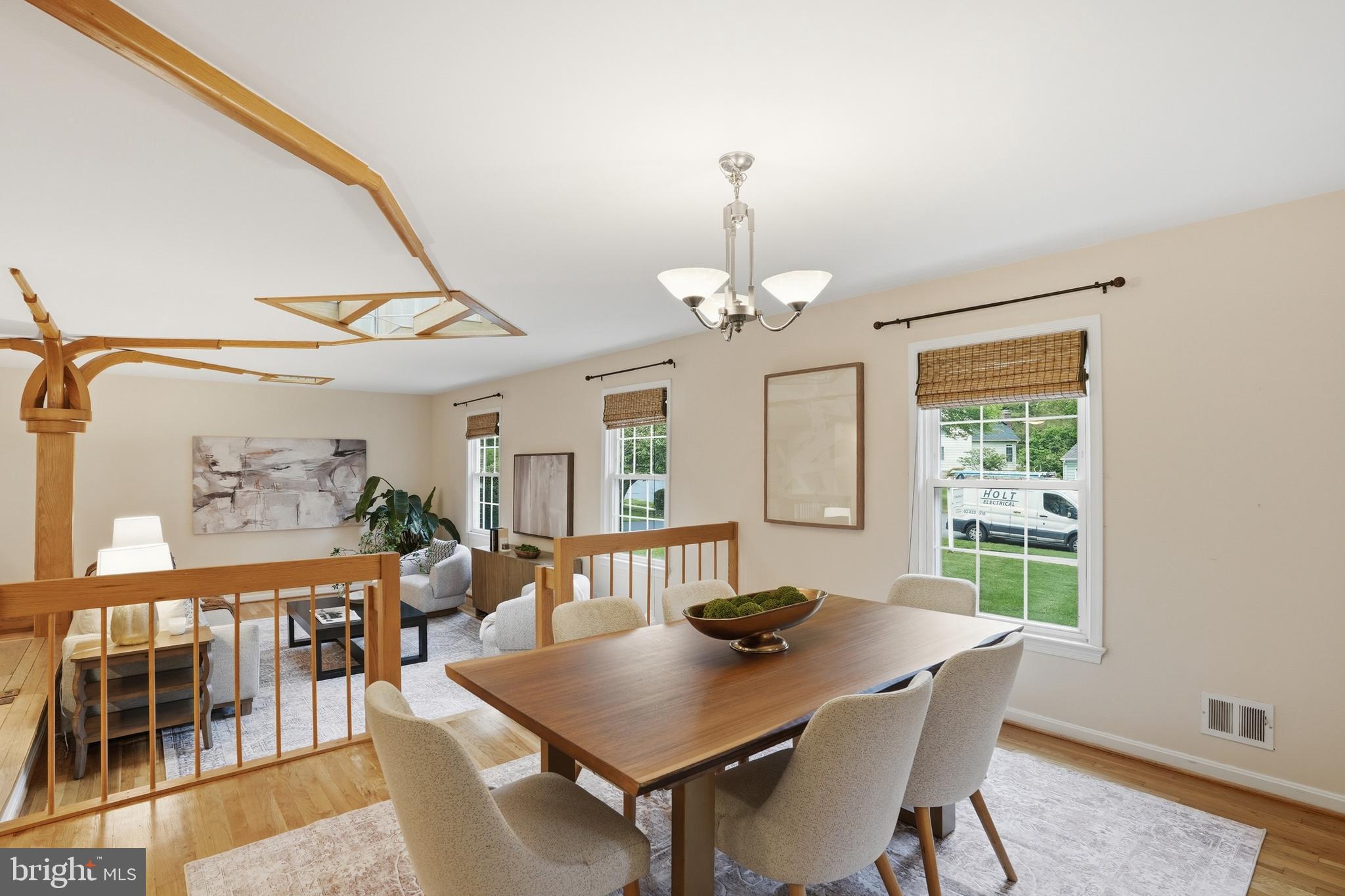 9614 Percussion Way Vienna, VA 22182 - Photo 11 of 45 a view of a dining room with furniture window and wooden floor