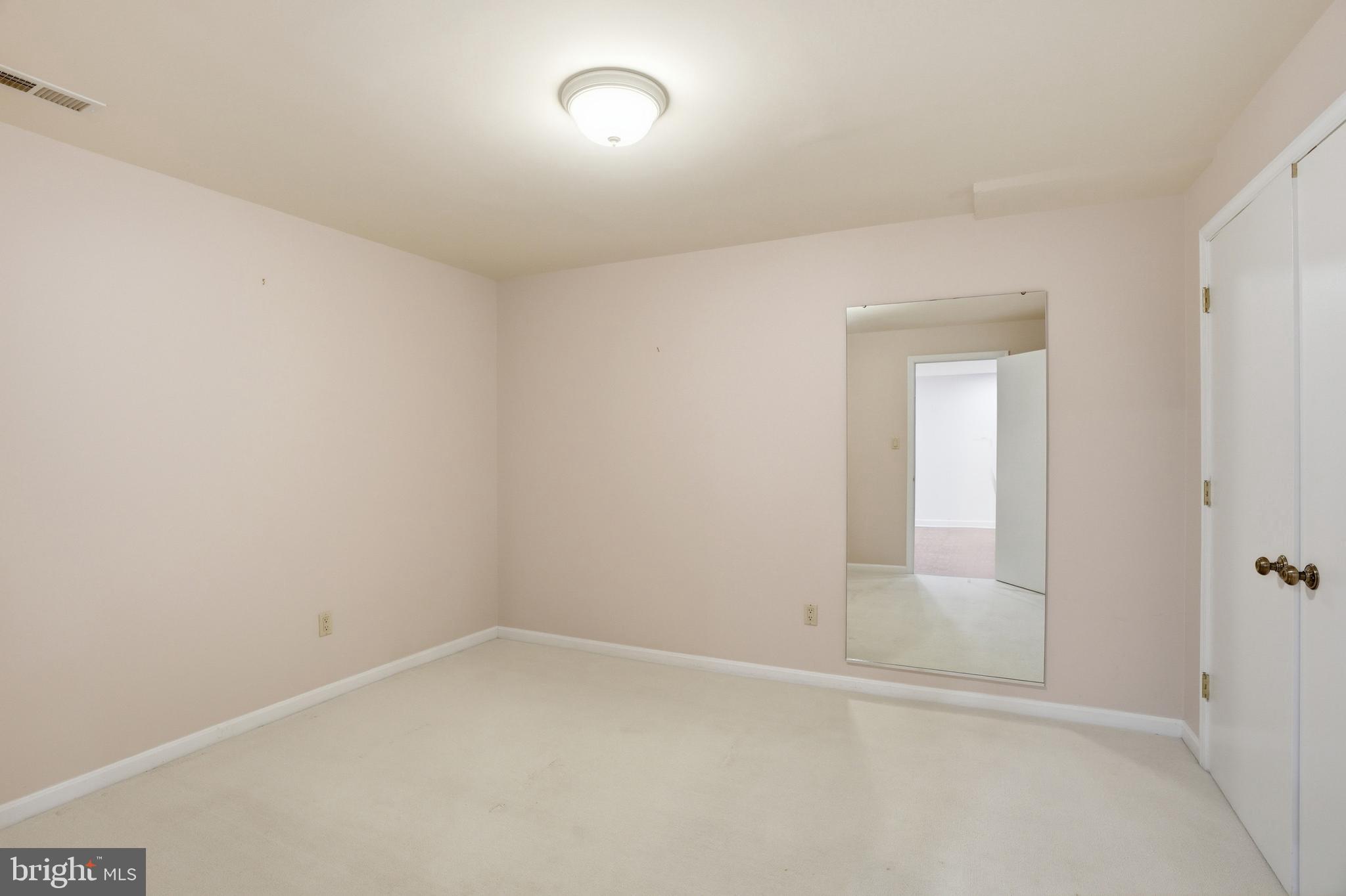 9614 Percussion Way Vienna, VA 22182 - Photo 35 of 45 an empty room with a empty space and windows