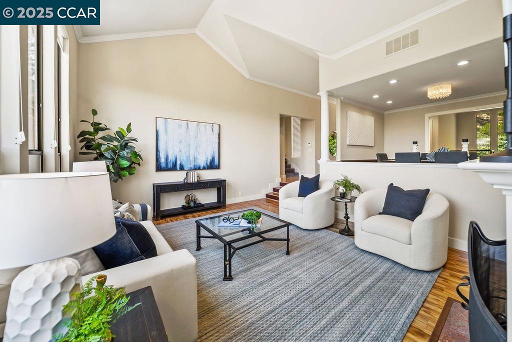 172 Rudgear Drive Walnut Creek, CA 94596 - Photo 24 of 51 a living room with furniture and a wooden floor
