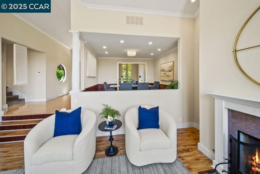 172 Rudgear Drive Walnut Creek, CA 94596 - Photo 25 of 51 a living room with furniture and a fireplace