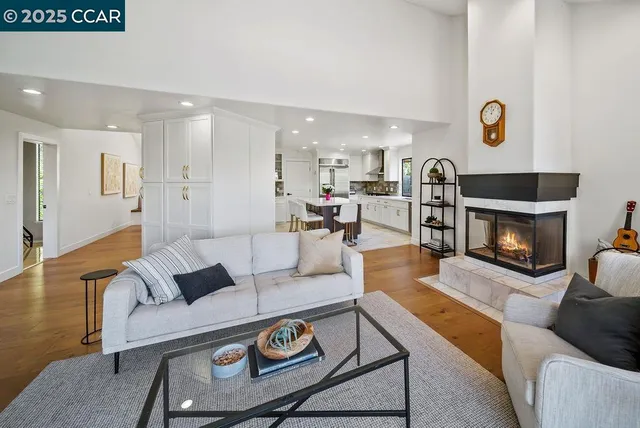 a stove top oven sitting inside of a kitchen