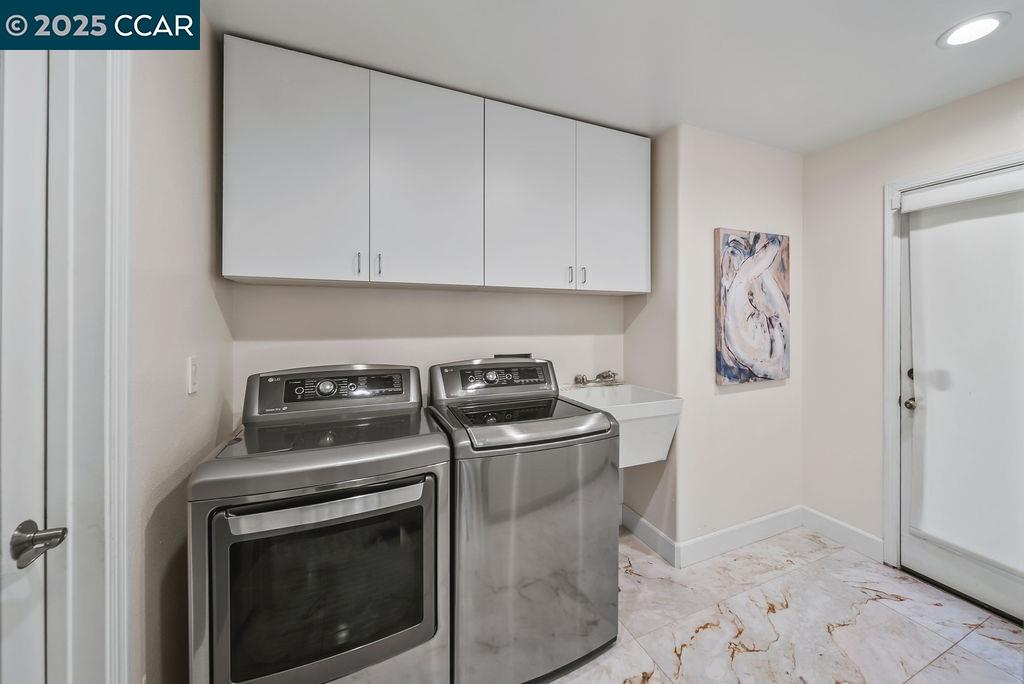 172 Rudgear Drive Walnut Creek, CA 94596 - Photo 48 of 51 a stove top oven sitting inside of a kitchen