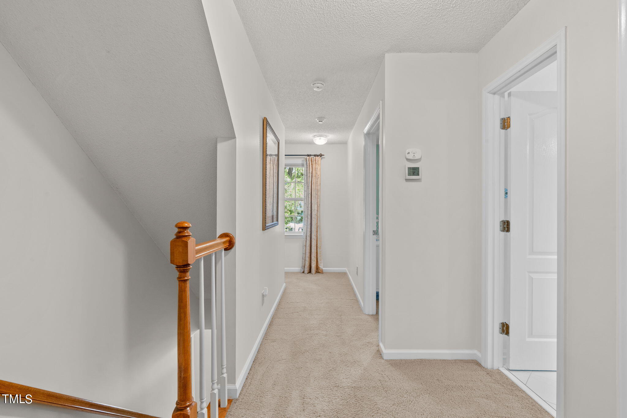 507 Heathridge Lane Cary, NC 27513 - Photo 29 of 42 Second Floor Hallway