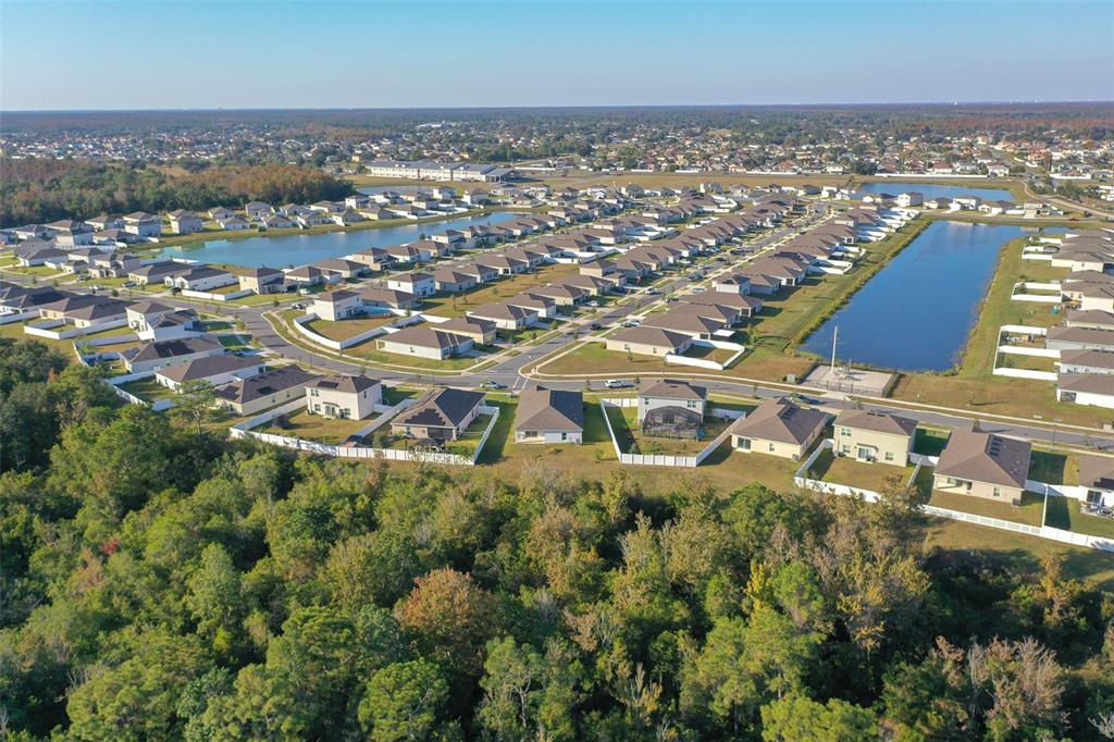 280 Citrine Loop Kissimmee, FL 34758 - Photo 24 of 25 an aerial view of residential building with parking space