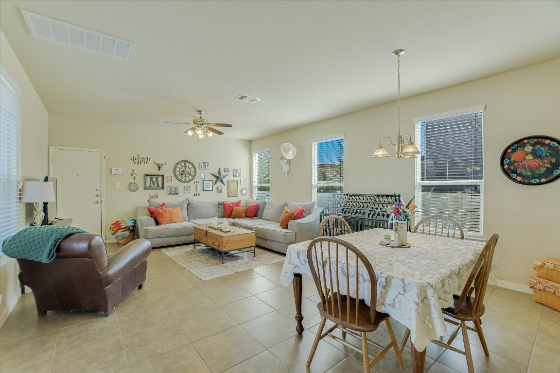1700 Zilker Drive Cedar Park, TX 78613 - Photo 4 of 19 a living room with lots of furniture and wooden floor