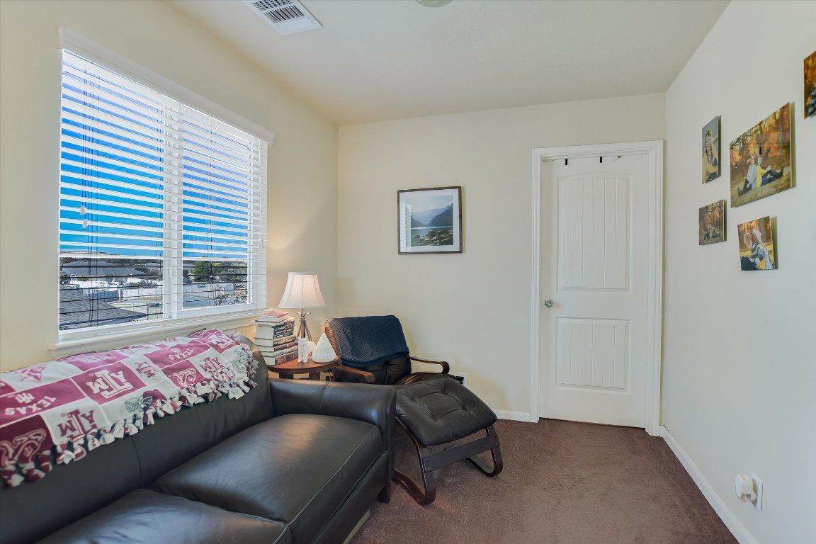 1700 Zilker Drive Cedar Park, TX 78613 - Photo 9 of 19 a bedroom with a bed and a window